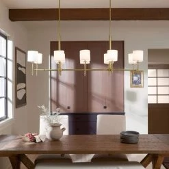 Ali 10-Light Brushed Natural Brass Traditional Dining Room Linear Chandelier with White Fabric Shades by KICHLER -Kichler Sales brushed natural brass kichler chandeliers 52503bnb e1 1000
