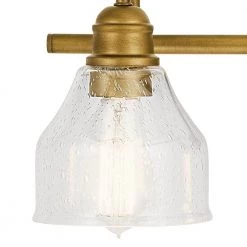Avery 24 in. 3-Light Natural Brass Bathroom Vanity Light with Clear Seeded Glass by KICHLER -Kichler Sales natural brass kichler vanity lighting 45973nbr 1f 1000