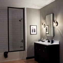 Braelyn 1-Light Olde Bronze Bathroom Indoor Wall Sconce with Clear Seeded Glass Shade by KICHLER 12 Braelyn 1-Light Olde Bronze Bathroom Indoor Wall Sconce with Clear Seeded Glass Shade by KICHLER -Kichler Sales olde bronze kichler vanity lighting 45457oz 44 1000